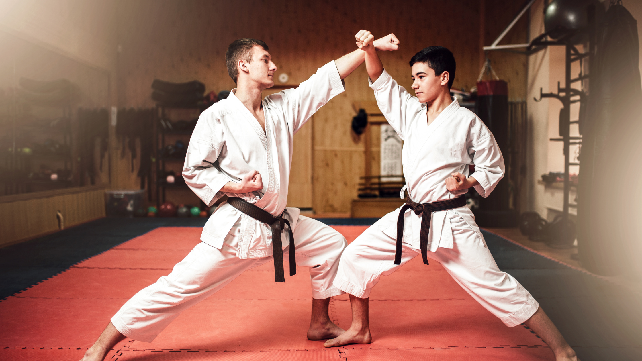 Trainer and student of martial arts during a training